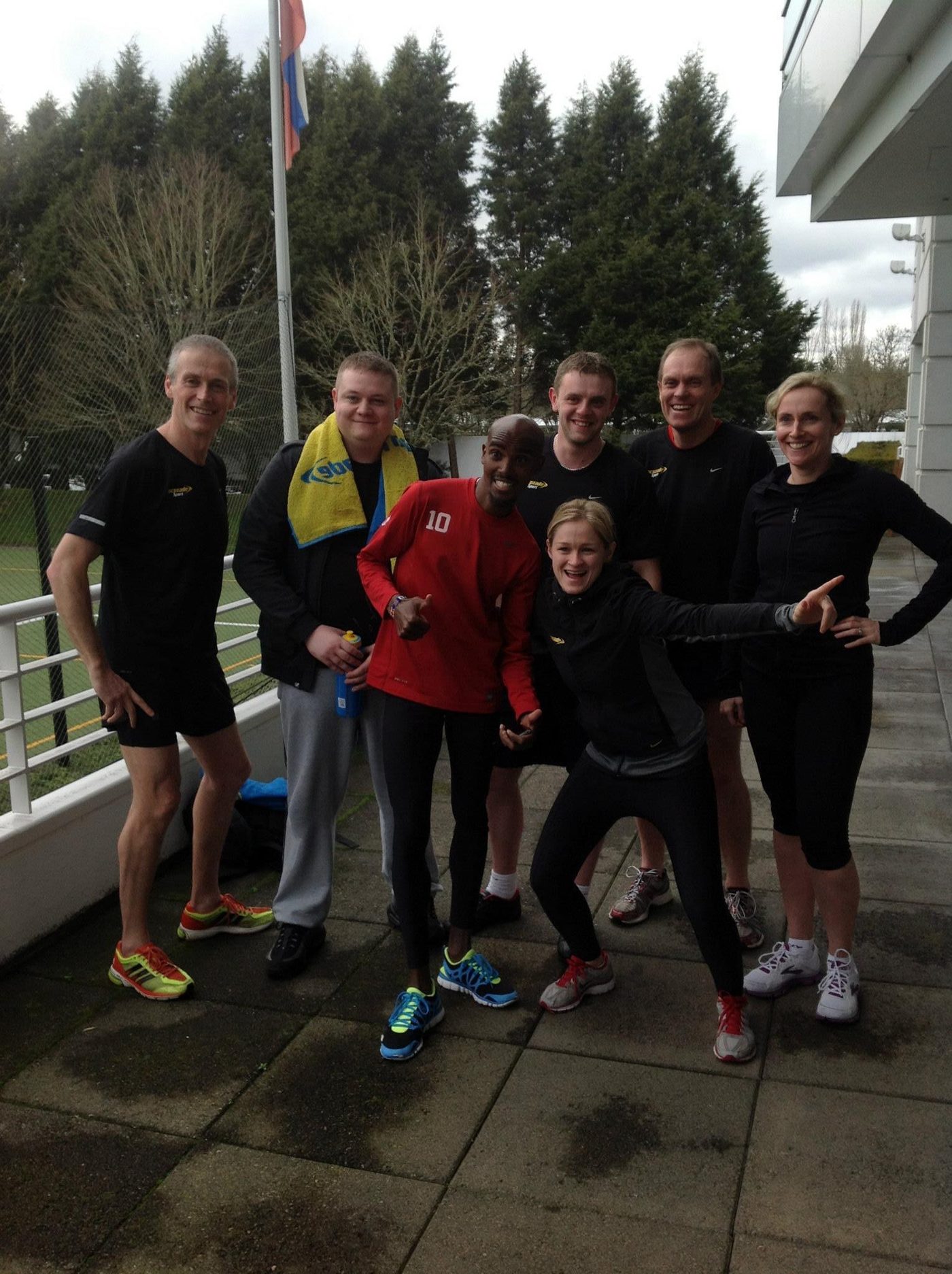Tess Morris-Paterson with Sir Mo Farah and training group